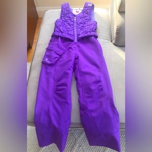 Obermeyer snow jumpsuit zippered front small butterfly patch on left shoulders